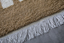 Custom light brown Moroccan rug with white checkered design
