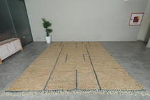 Handmade Beige Moroccan Wool Rug with Blue Lines – Custom Minimalist Berber Carpet