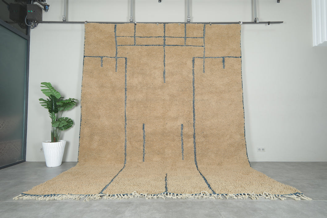 Handmade Beige Moroccan Wool Rug with Blue Lines – Custom Minimalist Berber Carpet