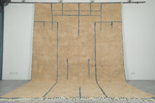 Handmade Beige Moroccan Wool Rug with Blue Lines – Custom Minimalist Berber Carpet
