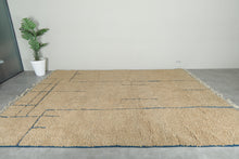 Handmade Beige Moroccan Wool Rug with Blue Lines – Custom Minimalist Berber Carpet