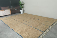 Handmade Beige Moroccan Wool Rug with Blue Lines – Custom Minimalist Berber Carpet