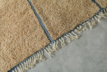 Handmade Beige Moroccan Wool Rug with Blue Lines – Custom Minimalist Berber Carpet