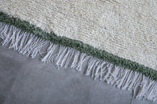 Handwoven Wool Rug in White with Green Frame Border