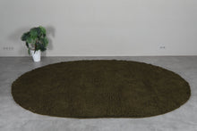 Handmade olive green oval wool rug - Minimalist custom carpet