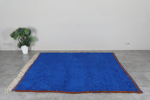 Custom Moroccan wool rug - Deep cobalt blue rug with warm rust border