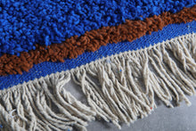 Custom Moroccan wool rug - Deep cobalt blue rug with warm rust border