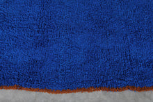 Custom Moroccan wool rug - Deep cobalt blue rug with warm rust border