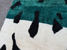 Custom abstract Moroccan rug in green, black & cream wool