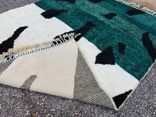 Custom abstract Moroccan rug in green, black & cream wool