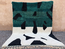 Custom abstract Moroccan rug in green, black & cream wool