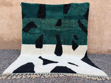 Custom abstract Moroccan rug in green, black & cream wool