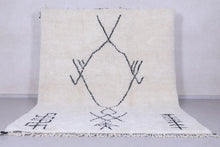 Handmade Moroccan Beni Ourain Rug – White Wool with Black Geometric Symbols