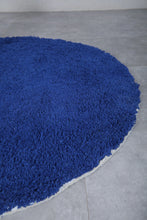 Handmade custom round Moroccan rug in bold blue