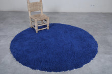 Handmade custom round Moroccan rug in bold blue