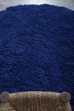 Handmade custom round Moroccan rug in bold blue