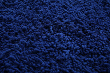 Handmade custom round Moroccan rug in bold blue