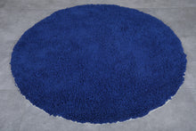 Handmade custom round Moroccan rug in bold blue