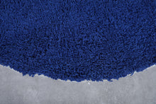 Handmade custom round Moroccan rug in bold blue