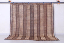 Vintage Tuareg rug 5.8 X 6.7 Feet